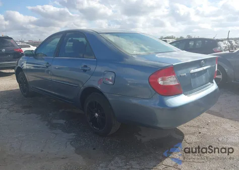 2004 Toyota Camry Le z USA, uszkodzony, nr VIN 4T1BE32K14U848988